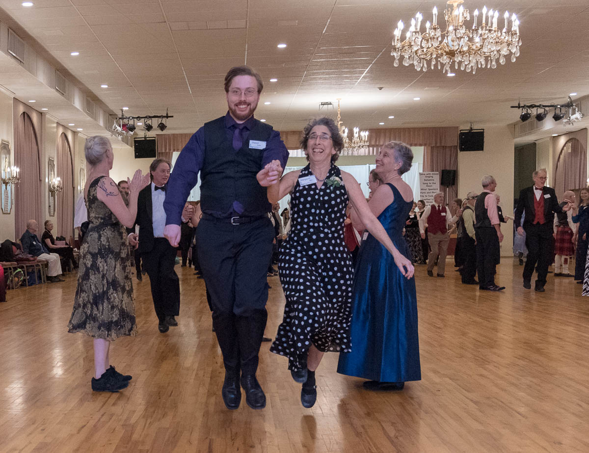 smiling dancers dashing to the top
